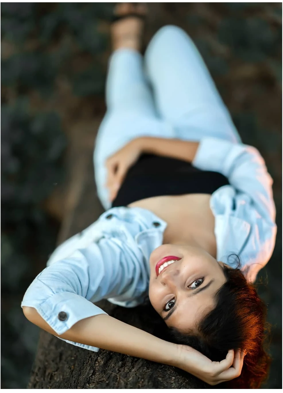 Inverted perspective lifestyle portrait on tree